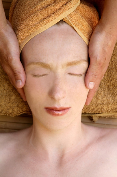 Beautiful woman portrait relaxing head massage - Photo, image
