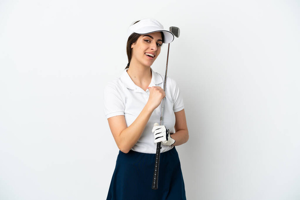 Belle jeune golfeuse femme isolée sur fond blanc fière et satisfaite de soi - Photo, image
