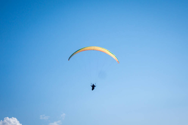 paragliding flight in the mountains. Le Grand-Bornand, Haute-Savoie, France - Fotó, kép
