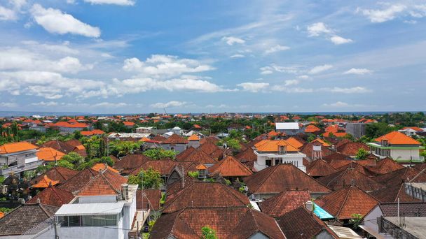 Aerial view over the roofs of houses in Canggu, Bali - Photo, Image