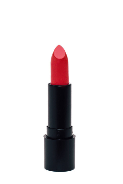 Red modern moisturizing lipstick in black base isolated on white background. - Foto, afbeelding