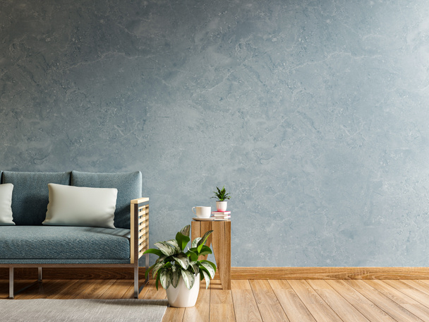 Prázdný obývací pokoj s modrou pohovkou a stolem na prázdném modrém betonovém pozadí.3D vykreslování - Fotografie, Obrázek