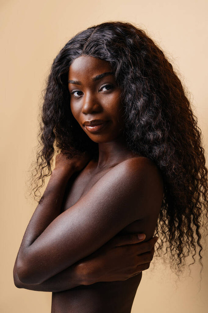 Beauty portrait of beautiful black woman wearing lingerie underwear - Pretty african young woman posing in studio, concepts about beauty, cosmetology and diversity - Zdjęcie, obraz