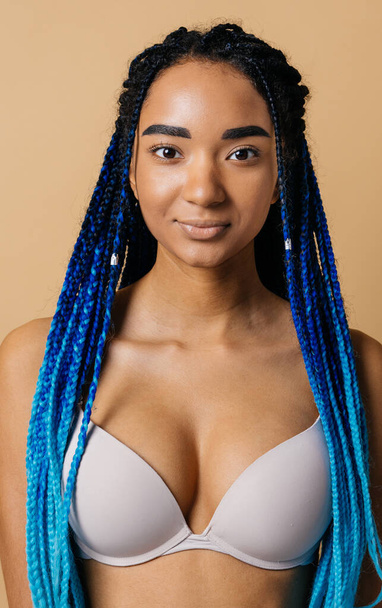 Beauty portrait of beautiful black woman wearing lingerie underwear - Pretty african young woman posing in studio, concepts about beauty, cosmetology and diversity - Foto, Imagen