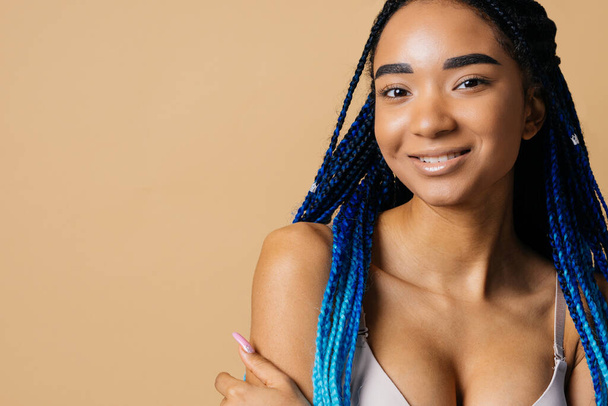 Beauty portrait of beautiful black woman wearing lingerie underwear - Pretty african young woman posing in studio, concepts about beauty, cosmetology and diversity - Foto, imagen