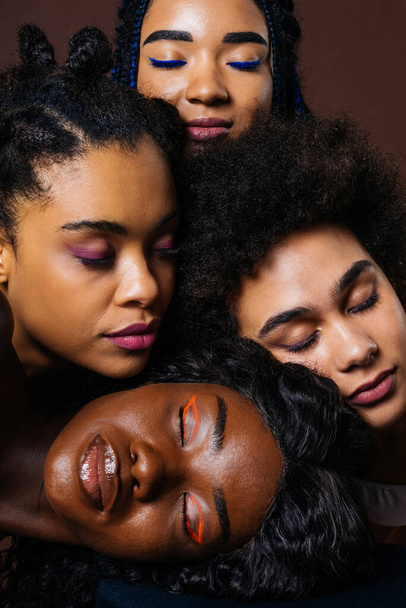 Beauty portrait of beautiful black women wearing lingerie underwear - Pretty african young women posing in studio, concepts about beauty, cosmetology and diversity - Foto, Imagen