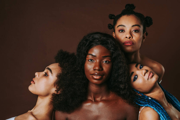 Beauty portrait of beautiful black women wearing lingerie underwear - Pretty african young women posing in studio, concepts about beauty, cosmetology and diversity - Fotografie, Obrázek