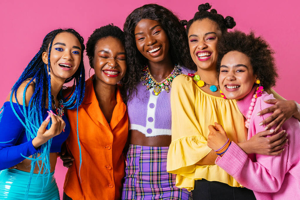 Beauty portrait of beautiful black women wearing colorful stylish clothes - Pretty african young women posing in studio, concepts about beauty, cosmetology and diversity - Fotoğraf, Görsel