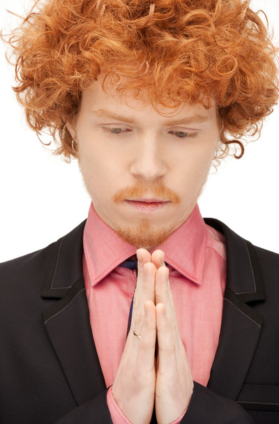 Praying businessman - Zdjęcie, obraz
