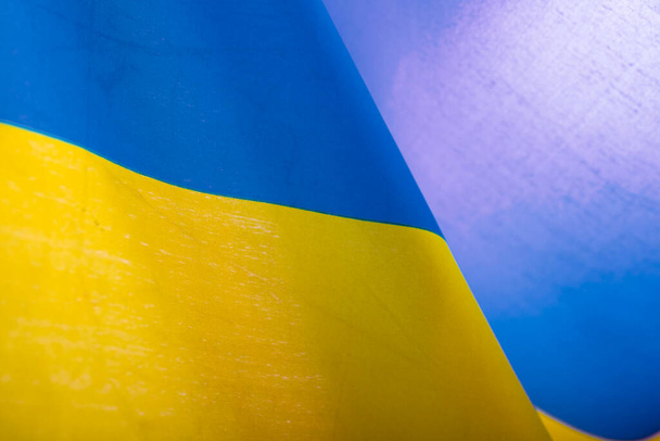 Flag of Ukraine. Blue and yellow colors. Close up shot, background - Foto, immagini