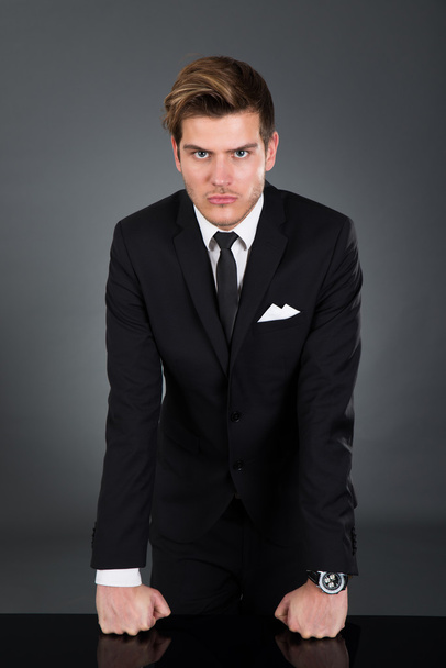 Angry Businessman Leaning On Table - Photo, Image
