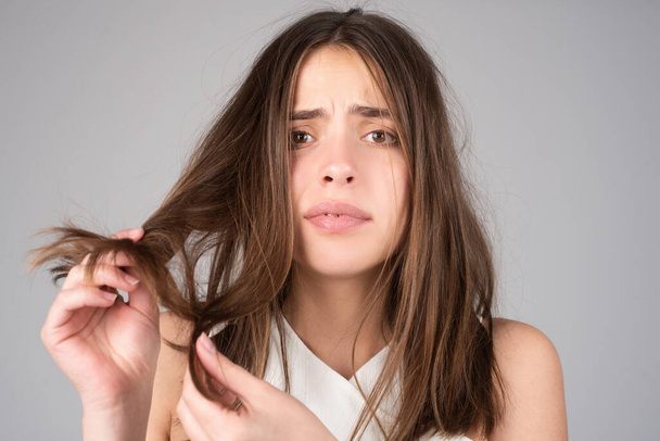 Woman worried about hair loss. Hair fall problem. - Foto, Imagen