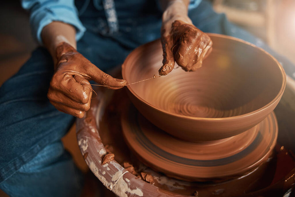 Unrecognized hand craft woman modeling tableware in pottery workshop - Fotó, kép