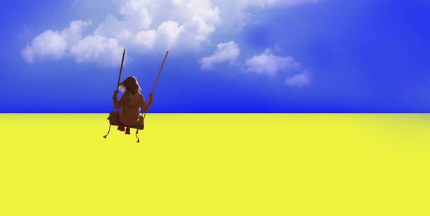 ロシアの侵略者からのウクライナの人々の自由の象徴としてのウクライナの旗の背景に雲の上にスイングに屈託のない幸せな若い子供のイメージ-ウクライナの占領と平和 - 写真・画像