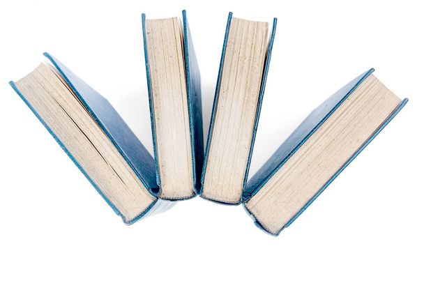 The row of books isolated over white background - Foto, Bild
