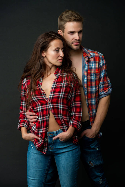 relationship of casual girl and guy on black background, love - Fotoğraf, Görsel