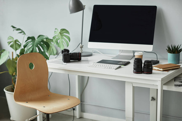 Background image of minimal photographers workplace with computer set up for photo editing - Photo, Image