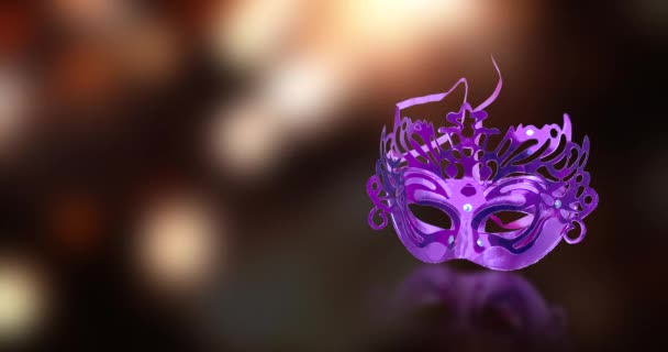 Koncepcja żydowskiego festiwalu Purim. Maska karnawałowa z ognistym tłem festiwalu bokeh - Materiał filmowy, wideo