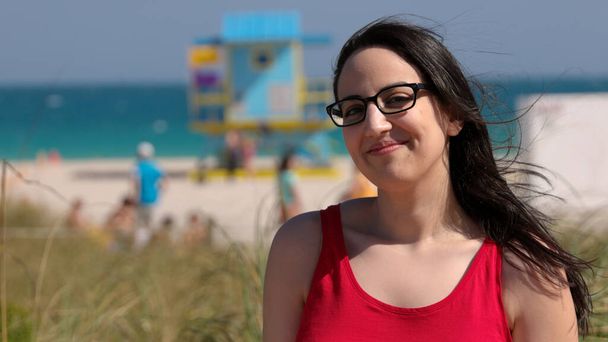 Pretty woman at Miami Beach enjoying the summer vacation - 写真・画像
