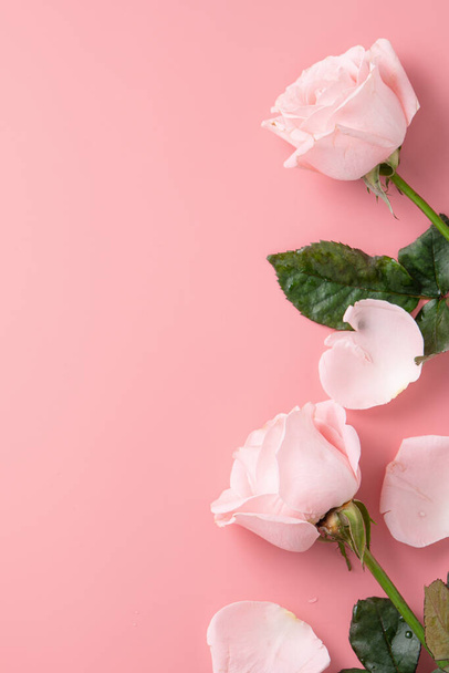 Mother's Day design concept background with pink rose flower on pink table background background - Fotó, kép