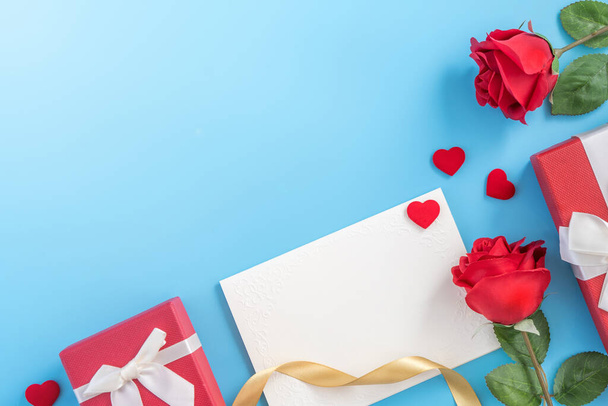 Beautiful greeting invitation card, concept of mother day, Valentine day, anniversary and birthday isolated on blue color background, copy space, top view, mock up, flat lay - Foto, immagini