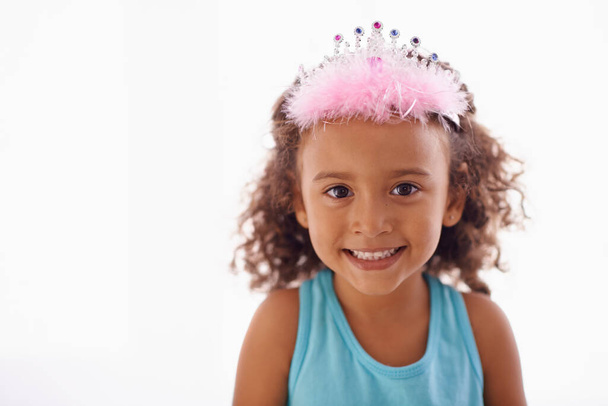 Shes just a little princess. Studio portrait of an adorable little girl in a tiara isolated on white. - Foto, imagen