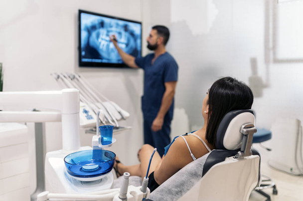 Dental Clinic Worker Showing X-ray - Фото, изображение