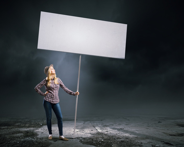 Woman with banner - Foto, afbeelding