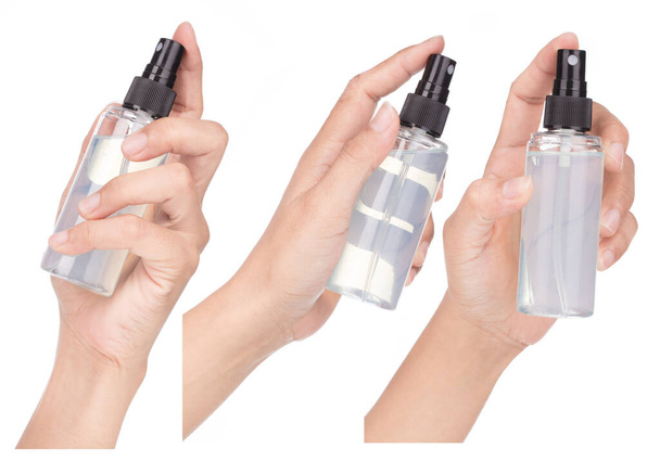 Coleção de mão segurando frasco de spray isolado no fundo branco - Foto, Imagem