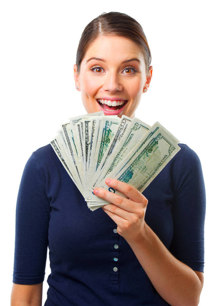 What is the best way to make money. Studio shot of a beautiful young woman holding a big amount of money. - Foto, Imagen