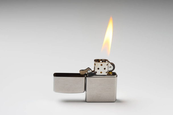 Brushed chrome lighter with windproof. One of everyday carry item for men.  - Foto, Imagem
