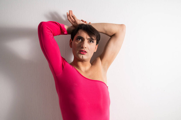 Homosexual in a pink female dress. A man in make-up. - Photo, Image