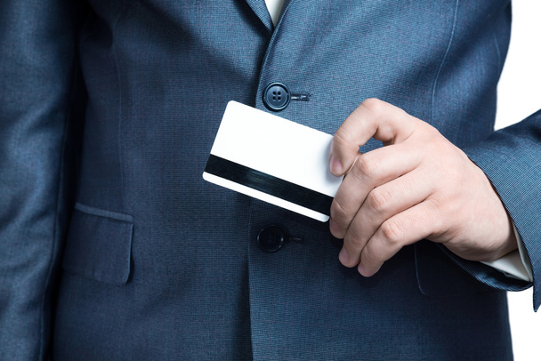 man in jacket holding a credit card - Foto, Bild