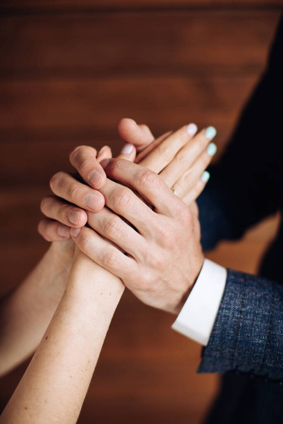 Man holding the hand of his beloved woman - Φωτογραφία, εικόνα
