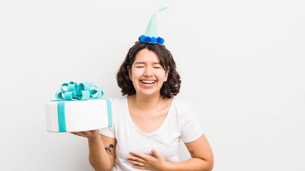 pretty hispanic girl laughing out loud at some hilarious joke. birthday concept - Photo, Image