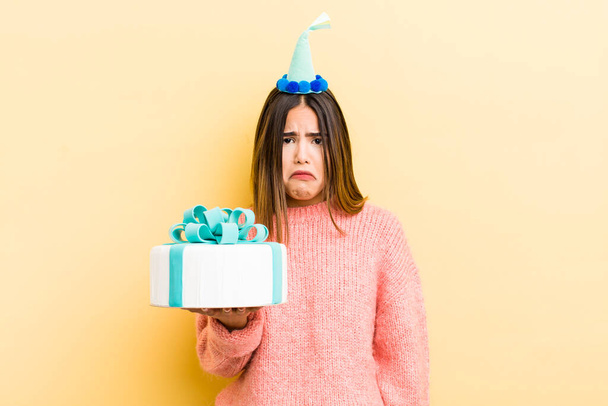 pretty hispanic girl feeling sad and whiney with an unhappy look and crying. birthday concept - Fotoğraf, Görsel