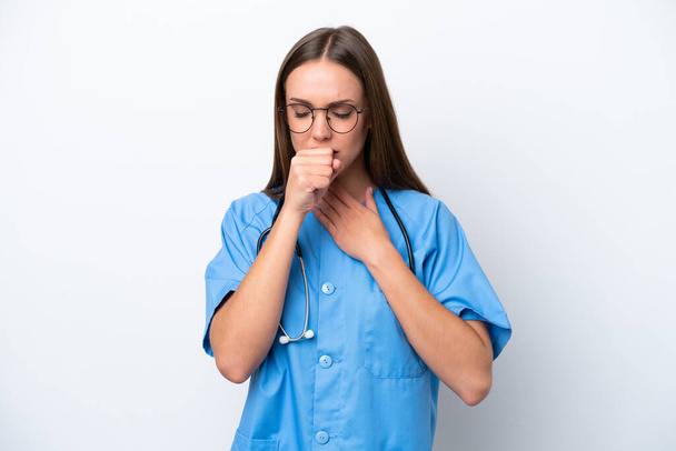 Young nurse caucasian woman isolated on white background is suffering with cough and feeling bad - 写真・画像