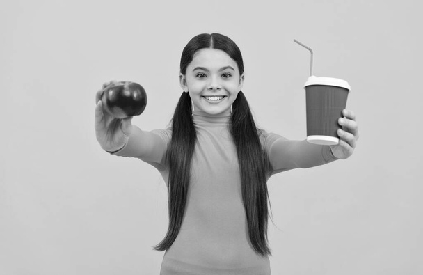 lunch break. teen girl drinking fruit tea. portrait of enjoyment. happy child with healthy food. - Photo, Image