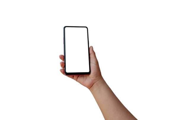 The hand is holding the white screen, the mobile phone is isolated on a white background with the clipping path. - Valokuva, kuva