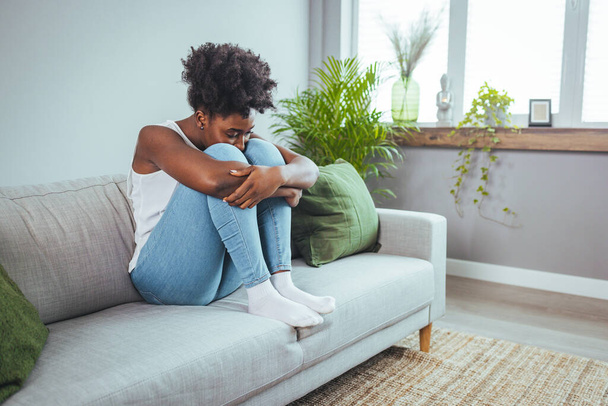 Depressed upset young woman feeling hurt sad stressed troubled with unwanted pregnancy, regret mistake abortion, having headache or drug addiction, suffer from grief dramatic bad problem concept - Photo, image