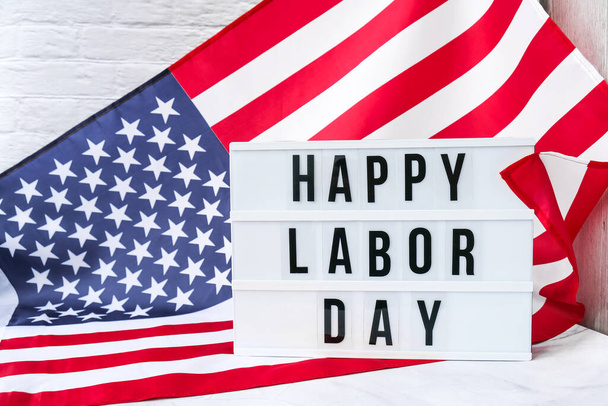 American flag. Lightbox with text HAPPY LABOR DAY Flag of the united states of America. July 4th Independence Day. USA patriotism national holiday. Usa proud. - 写真・画像
