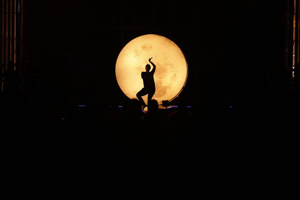 Dancer silhouette in the Moonset - Photo, Image