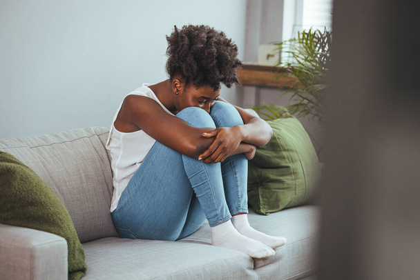 Depressed upset young woman feeling hurt sad stressed troubled with unwanted pregnancy, regret mistake abortion, having headache or drug addiction, suffer from grief dramatic bad problem concept - Photo, Image
