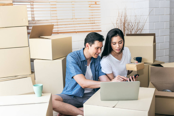 Asian couple, Entrepreneurs, start their own small business at home By trading Through the online channel,  to SME e-commerce and new normal concept - Photo, Image
