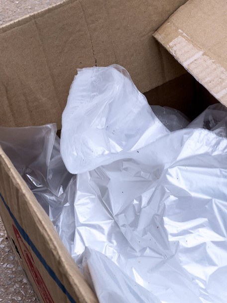 Pack of transparent plastic bags in a box - Foto, afbeelding