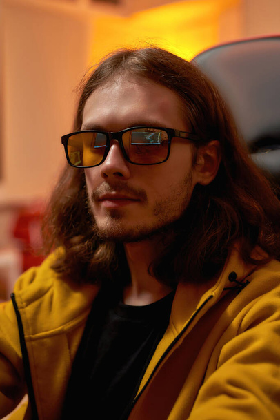 IT developer in glasses with programming code - Fotografie, Obrázek