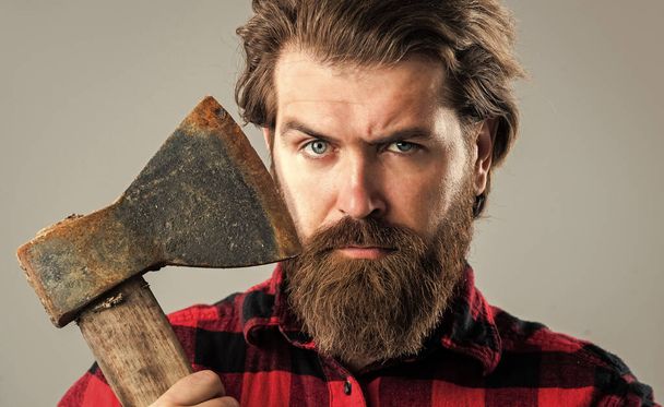brutal man lumberjack with axe cut hair, barbershop - Fotoğraf, Görsel