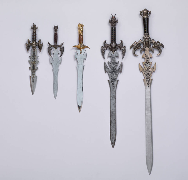 collection of medieval swords, knives and daggers - Photo, Image