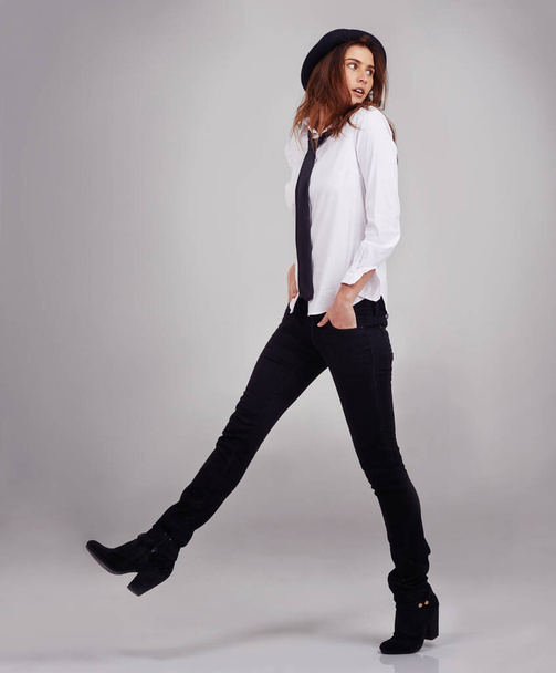 Wear your style with attitude. Full length studio shot of a stylishly-dressed young woman. - Фото, изображение