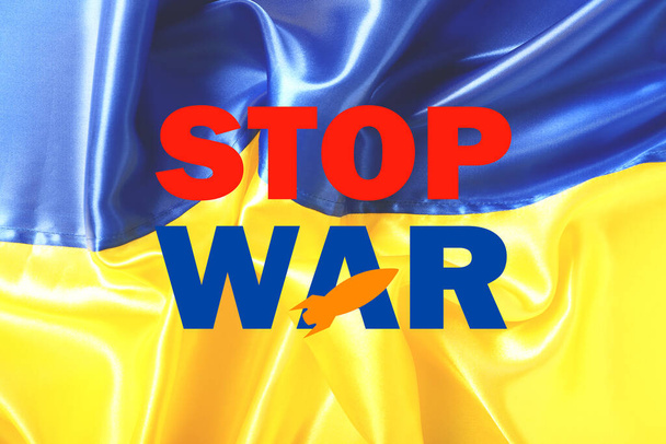 Text STOP WAR na vlajce Ukrajiny - Fotografie, Obrázek